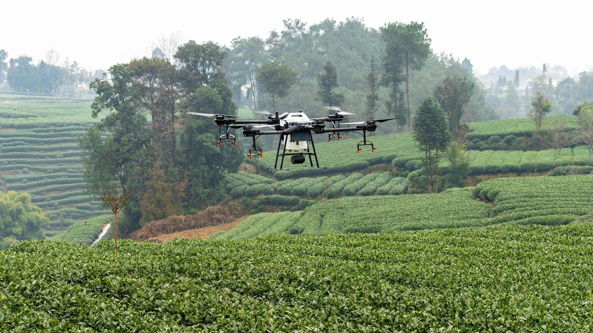 Agricultural drone operating above farmland